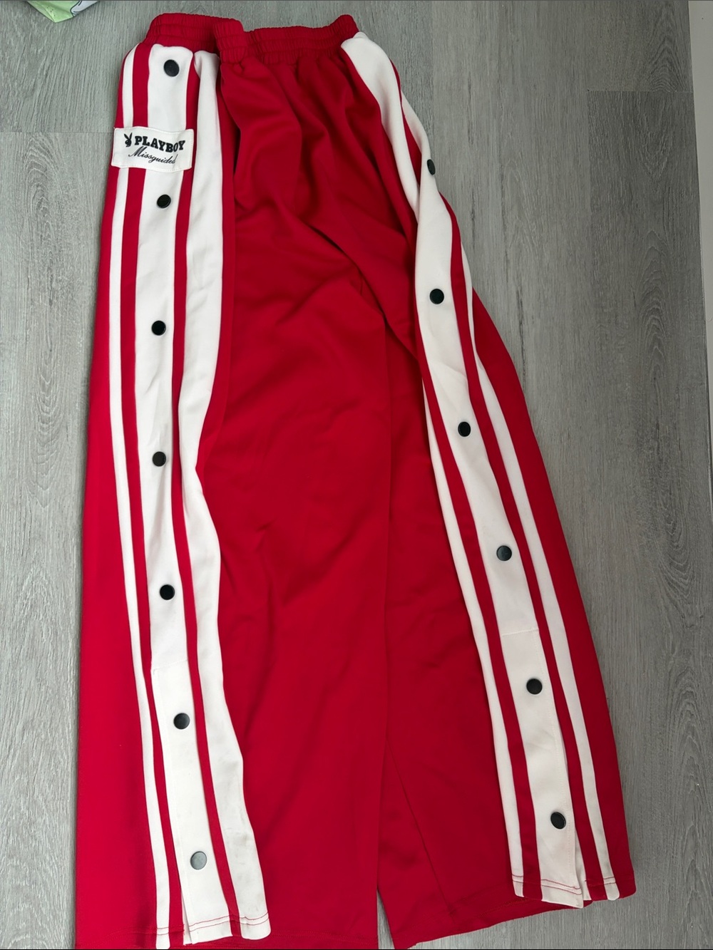 PLAYBOY Red Track Pants with White Side Stripes and Black Snap Buttons